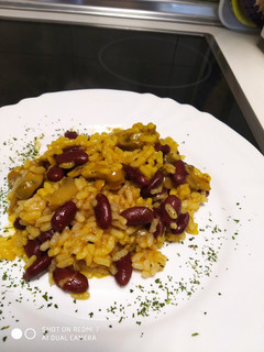 Una foto de Arroz con habichuelas pintas y champiñones