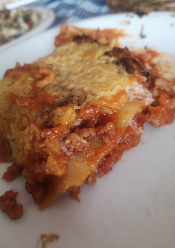 Una foto de Lasaña boloñesa casera