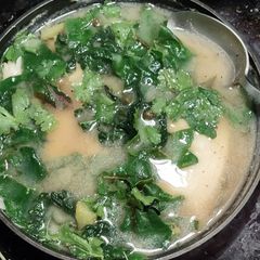 A picture of Chinese greens with sole soup.