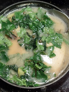 A picture of Chinese greens with sole soup.