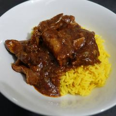 A picture of Rice and lamb stew.