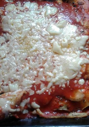 Una foto de Canelones con pollo, jamón, 2 quesos y zucchini