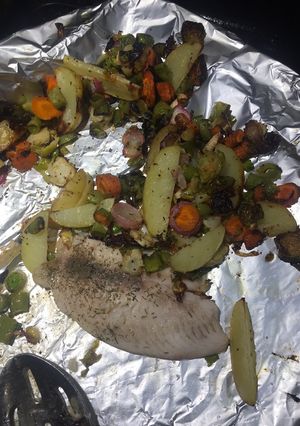 A picture of Sheet pan tilapia & vegetable medley.
