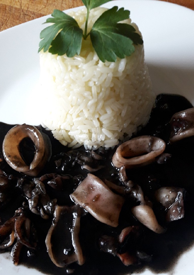 Una foto de Calamares en su tinta