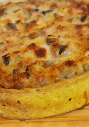 Una foto de Tarta de berenjena, queso y jamón