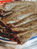 Creps de chocolate rellenos de manjar
