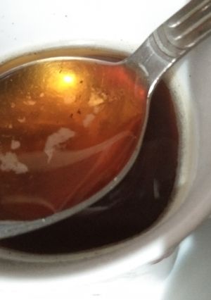 A picture of Black Tea with honey.