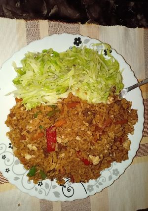 A picture of Chicken fried rice.