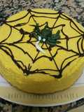 Tarta mousse de calabaza y adorno de tela de araña