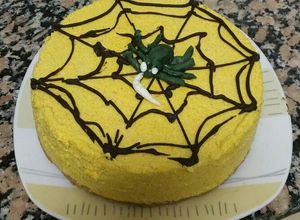 Foto principal de Tarta mousse de calabaza y adorno de tela de araña