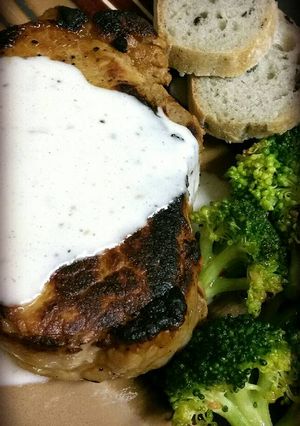 A picture of Grilled Pork Medallions with Alabama White BBQ Sauce.
