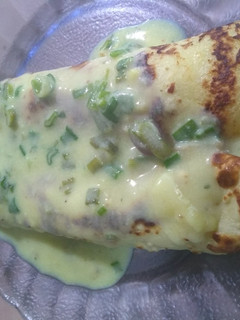 Una foto de Canelones de Pollo con Salsa de Crema y Panceta