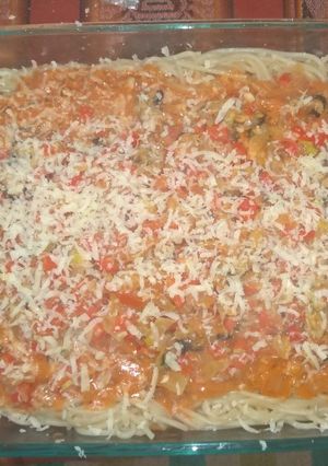 Una foto de Tallarines con mariscos y salsa rosa