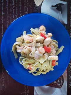 Una foto de Ensalada de nidos de espinacas