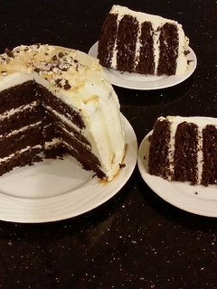 A picture of Mocha Layer Cake with Whipped Mascarpone Cream and a Coffee Glaze Drizzle.
