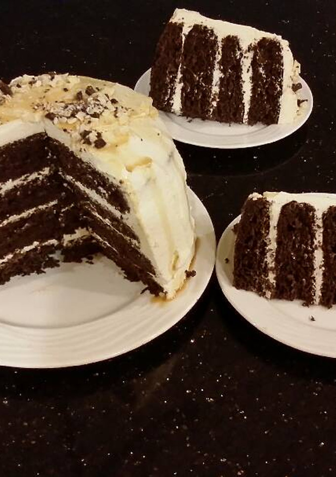 A picture of Mocha Layer Cake with Whipped Mascarpone Cream and a Coffee Glaze Drizzle.