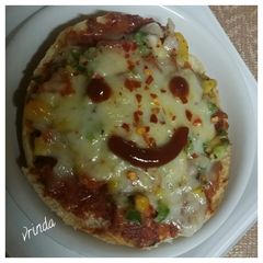 A picture of Smiley Cheesey Pizza.