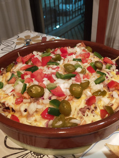 Una foto de Nachos supremos bien ricos😋😋