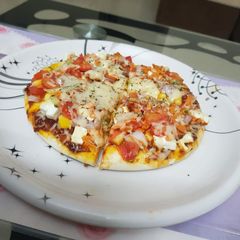 Veg pizza A picture of Veg pizza.
