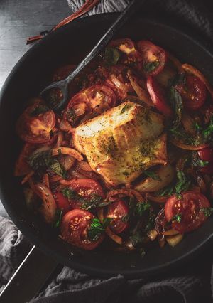 A picture of Pan Fried Cod With Onions & Tomatoes.