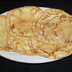 A picture of CREPES OR VERY THIN PANCAKES. JON STYLE.