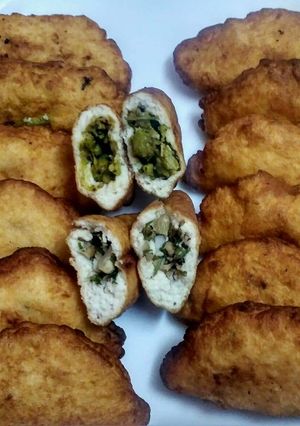 A picture of Stuffed gujiya dahi bhalle with two type stuffing.
