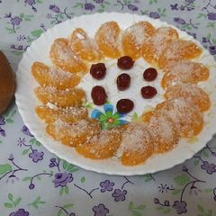 A picture of Fresh Organic powder sugar orange candy.