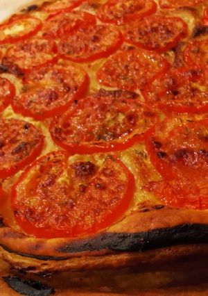 Une photo de Tarte fine tomates parmesan