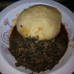 A picture of Vegetable soup and eba.