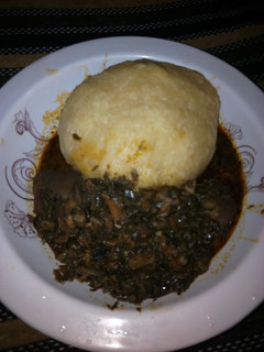 A picture of Vegetable soup and eba.