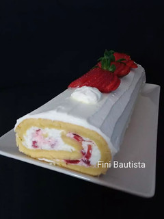 Una foto de Brazo gitano de fresas con nata