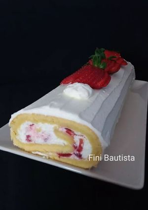 Una foto de Brazo gitano de fresas con nata