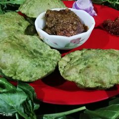 Palak puri with raw banana Tikki masala A picture of Palak puri with raw banana Tikki masala.