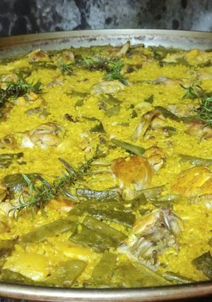 Una foto de Paella