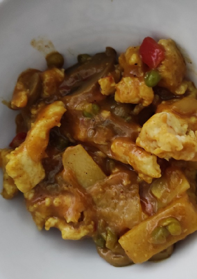 Una foto de Pollo al curry