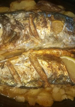 صورة لوصفة سمك وبطاطا في الفرن