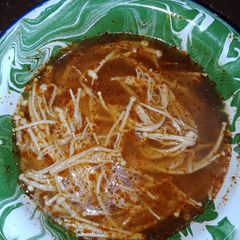A picture of Tom yum Enoki mushroom.