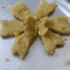 A picture of Besan halwa flower and butterfly.