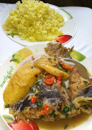 A picture of Tumeric and mustard seed rice, served with cat fish pepper soup.