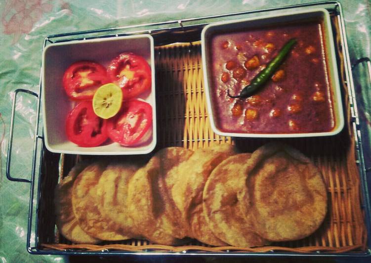 Chickpea(Chole)curry and carom (ajwian) poori