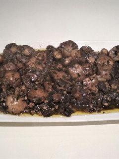 Una foto de Champiñones silvestres al ajillo