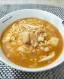 Arroz caldoso con sepia y caldo de alga fucus con azafrán
