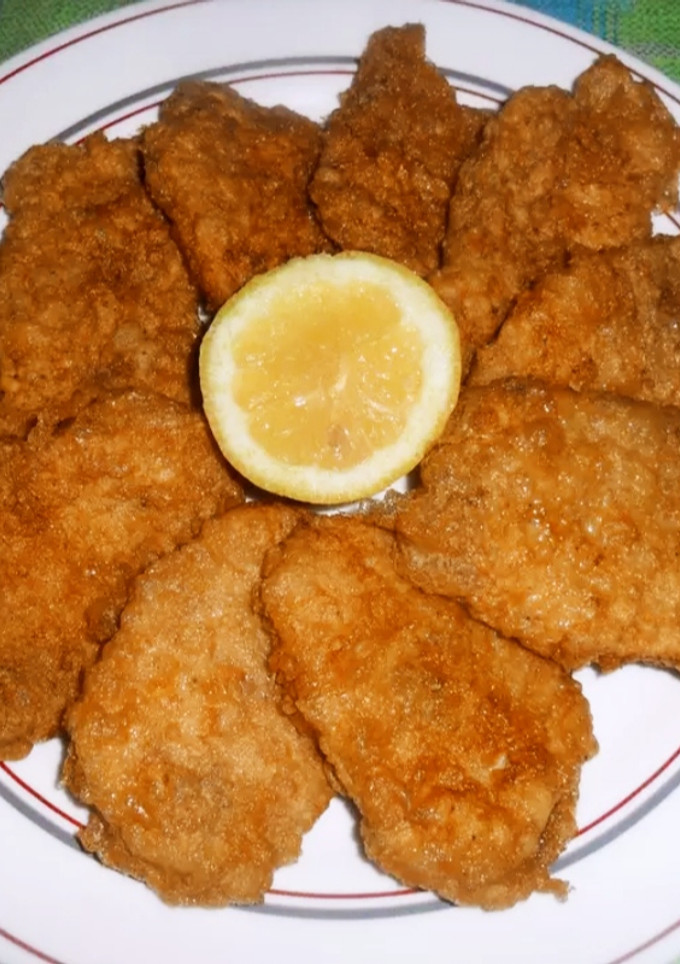 Una foto de Marineras de lomo de cerdo al ajo y perejil
