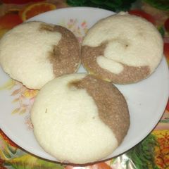 A picture of Chocolate Idli with Coconut -palm jaggery filling.