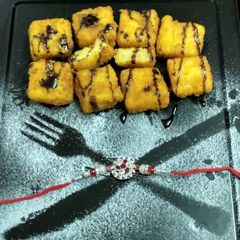 A picture of Fried custurd naggets.
