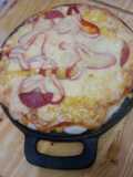 Pizza piña salami choclo pimentón