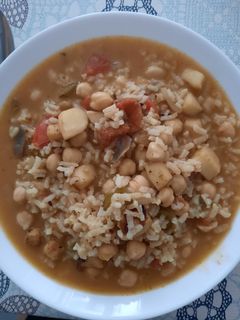 Una foto de Arroz caldoso con garbanzos y sepia