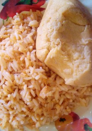A picture of Guragura jollof rice and moimoi.
