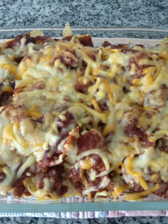 Una foto de Nachos con chili con carne y queso!!
