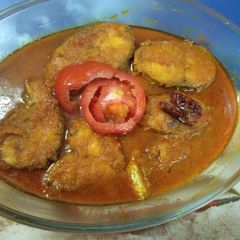 A picture of Raho fish curry with tomato gravy.